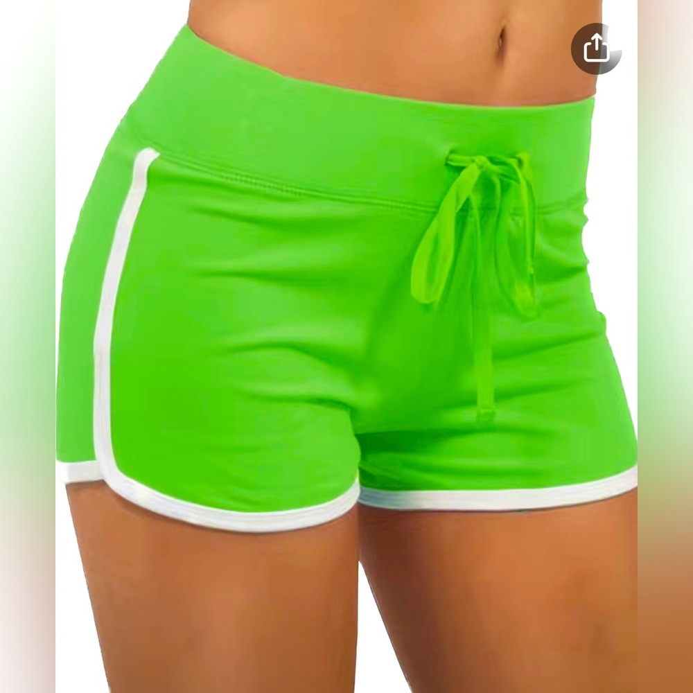 NWOT Y2K sports med size light green shorts, with elastic drawstrings.